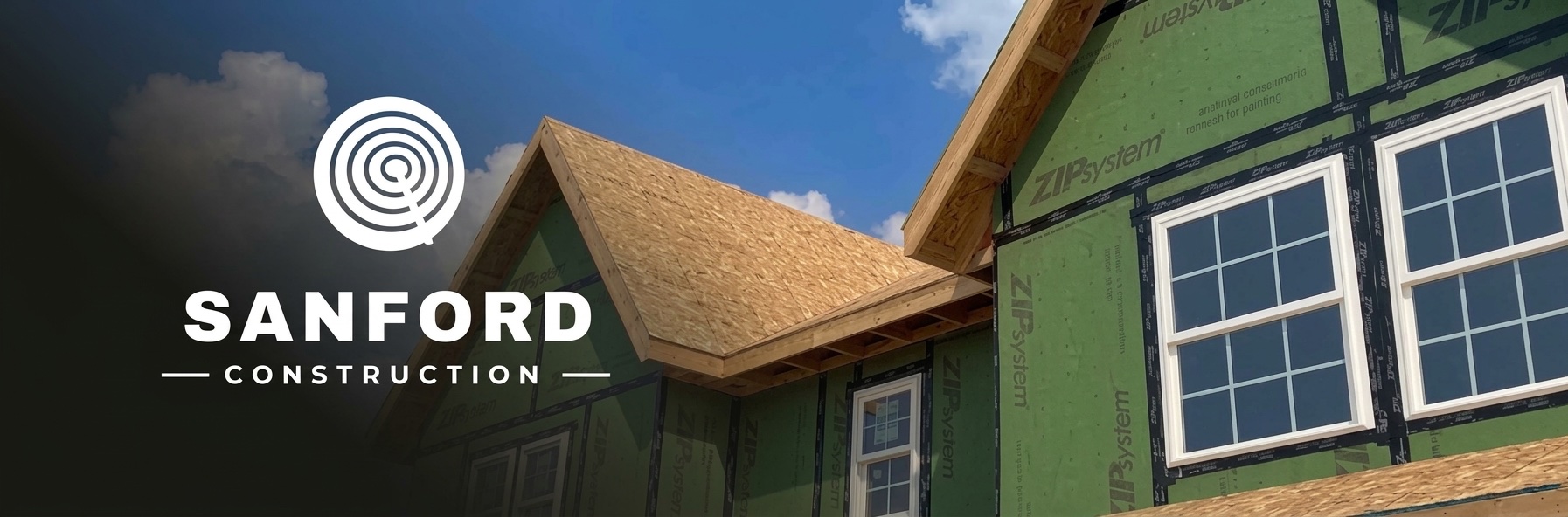 Sanford Construction logo and name over a photo of a new house in green ZIP System sheathing